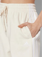 Adidas Pantaloni da tuta Essentials Studio Lounge 3-Stripes